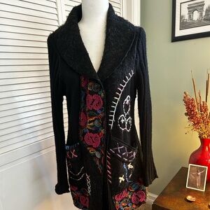 Unique sweater jacket. Black with colorful design.